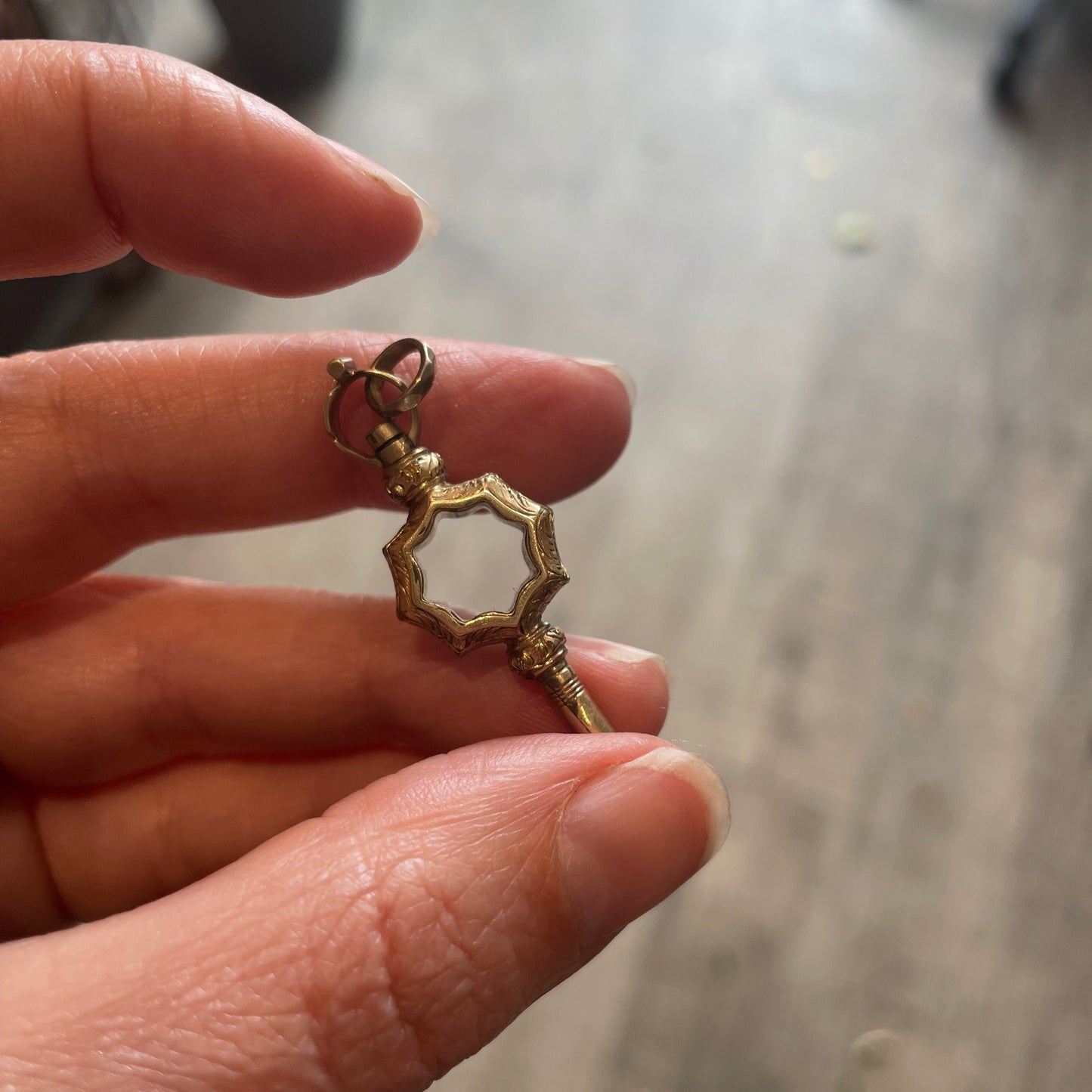 Antique watch key, a perfect antique pendant to hang on a chain, an old watch key.