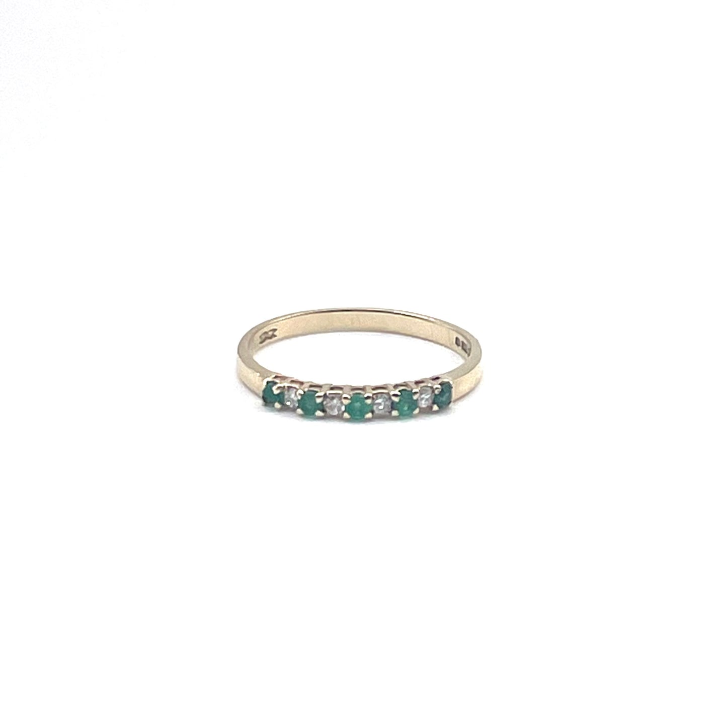 Fine alternating emerald and diamond stacking ring, preowned.