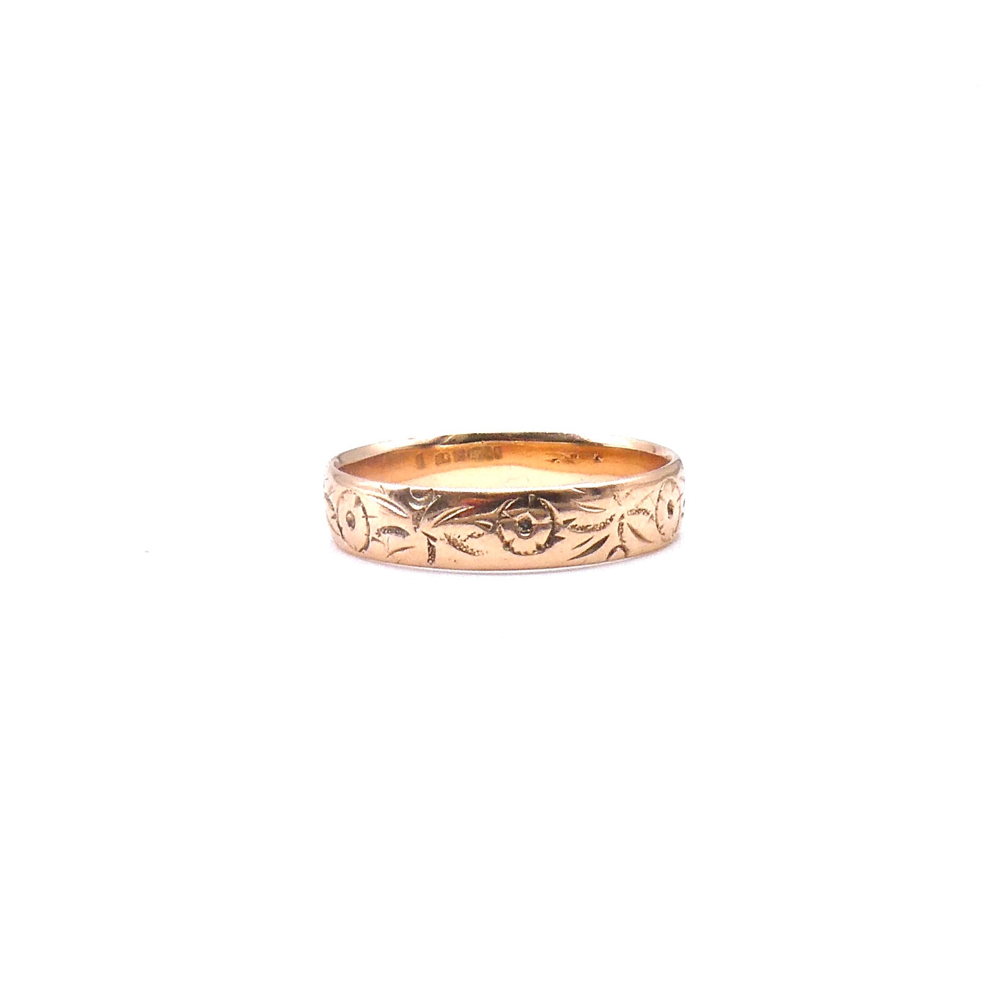 Antique engraved rose gold band encircled with a floral motif, 9kt gold.