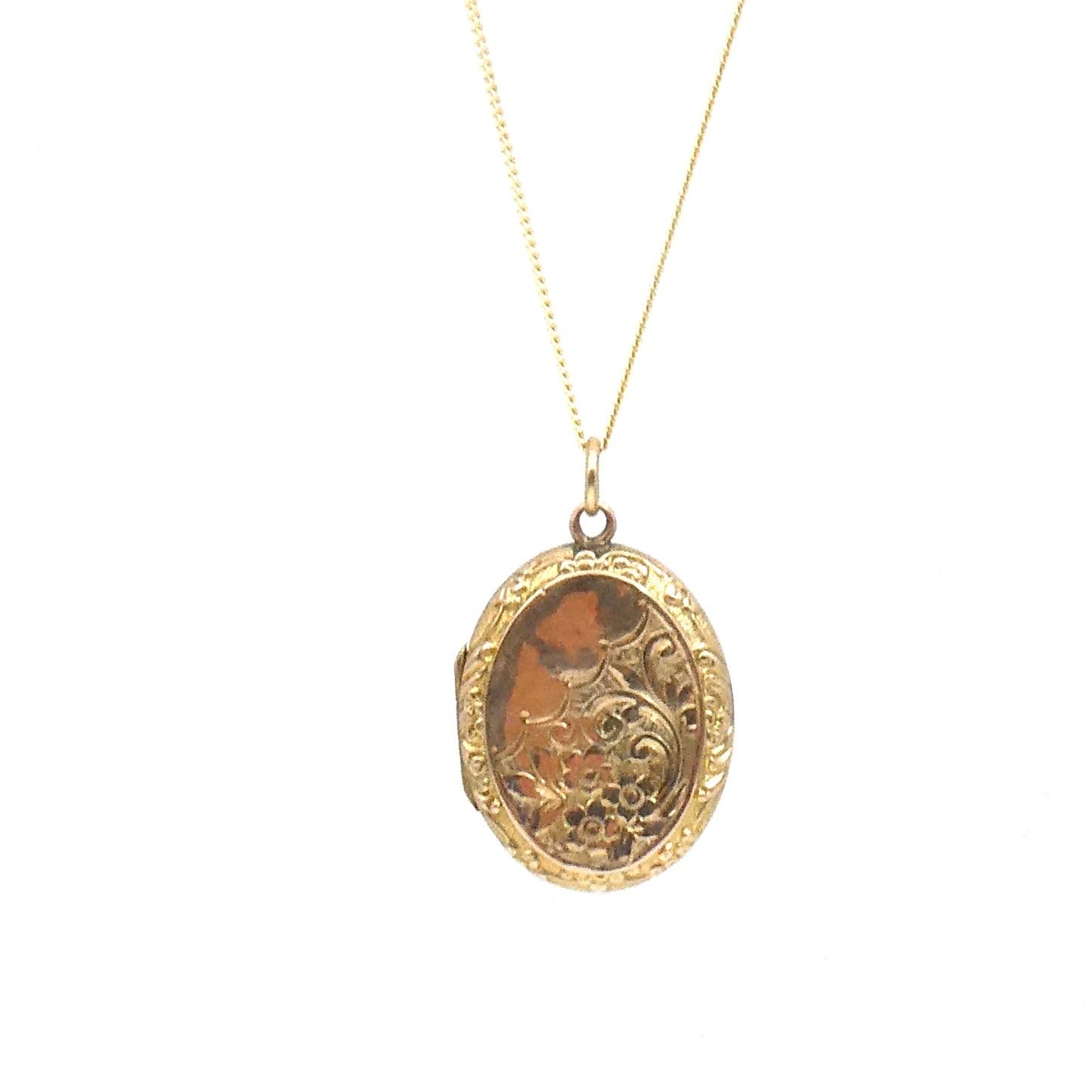 Engraved oval locket, antique gold back and front locket on a 9kt gold chain.