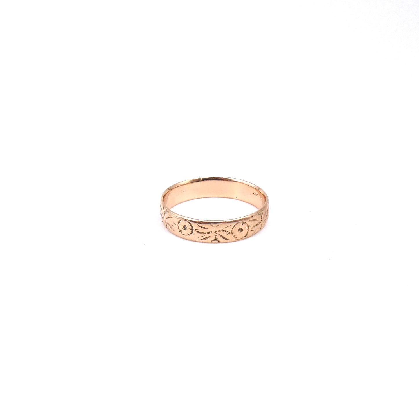 Antique engraved rose gold band encircled with a floral motif, 9kt gold.