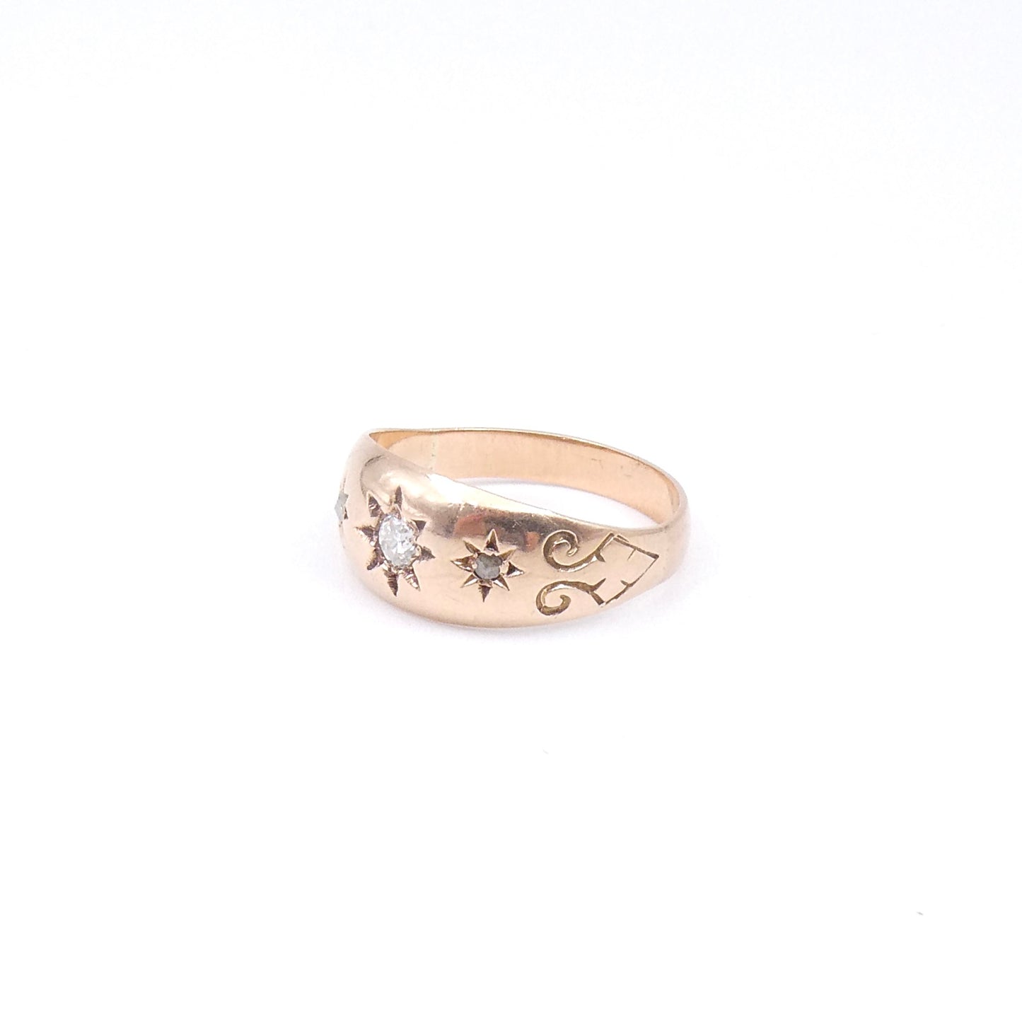 Vintage diamond gypsy ring star set, 9kt rose gold with engraved shoulders.