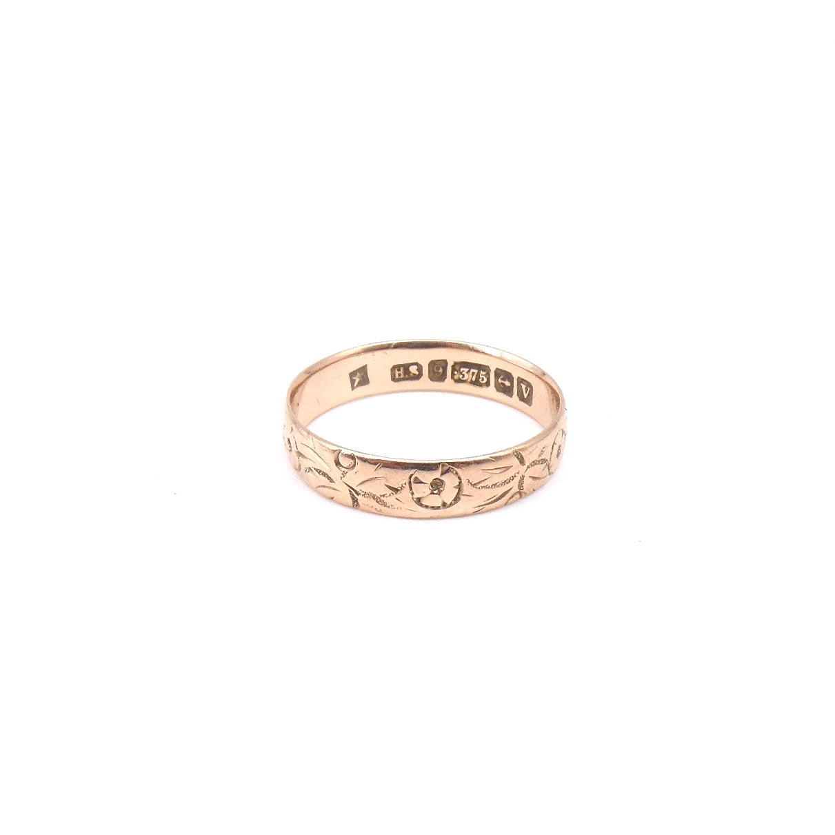 Antique engraved rose gold band encircled with a floral motif, 9kt gold.