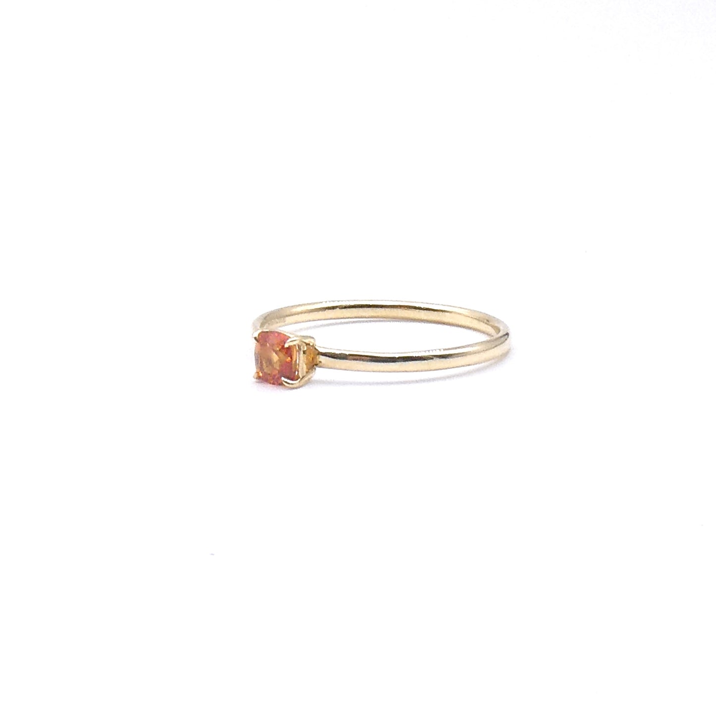 An Orange Sapphire cushion cut ring ring, a fine 9kt gold ring.