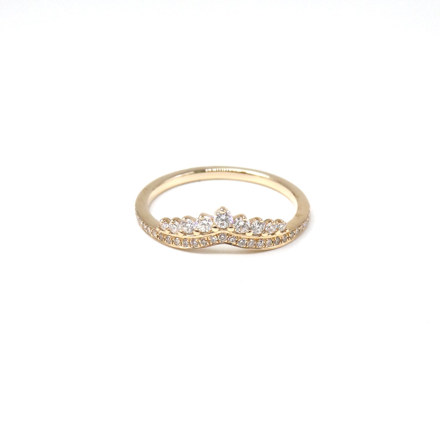 A New Diamond ring with a crown of graduating sized diamonds.