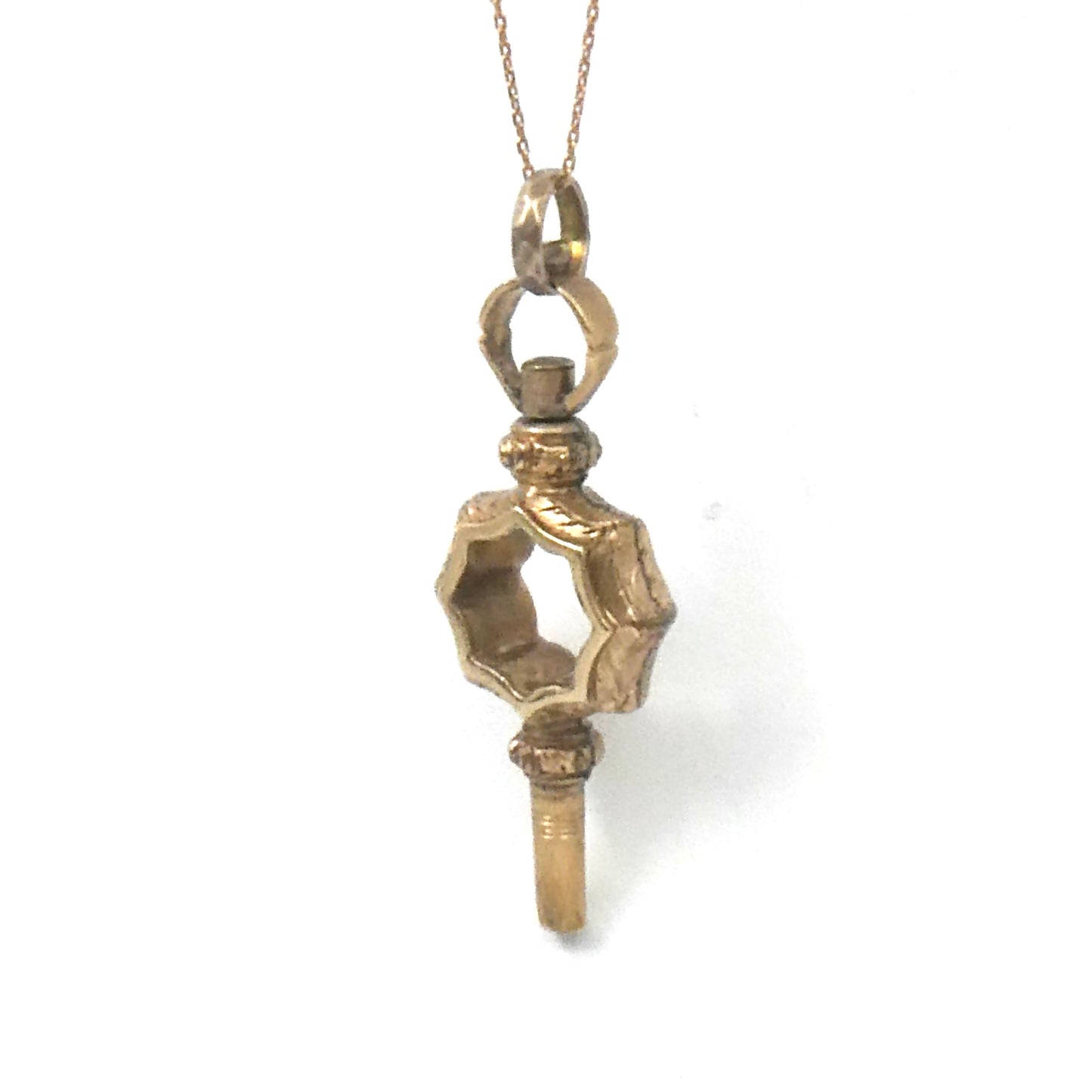 Antique watch key, a perfect antique pendant to hang on a chain, an old watch key.
