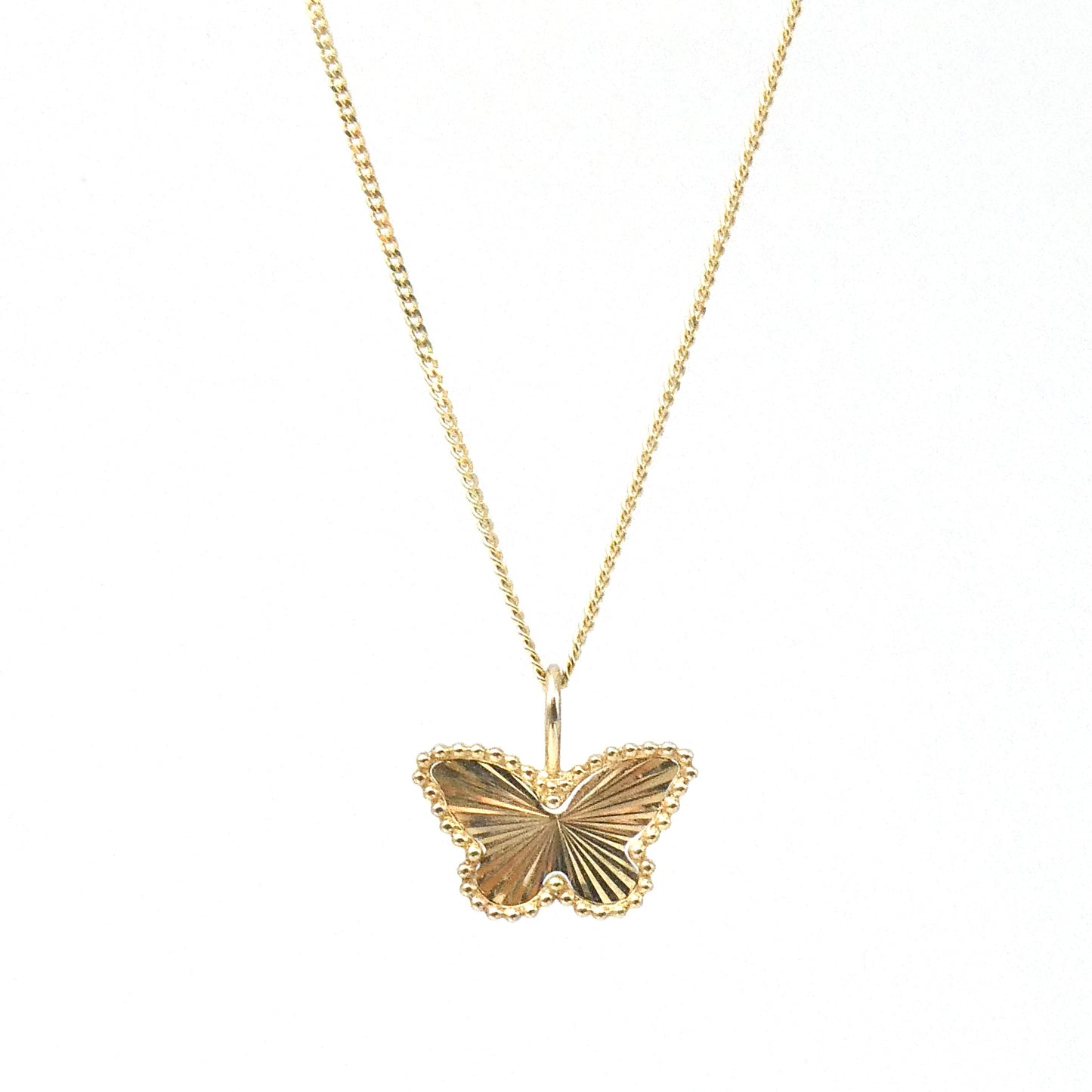 A 9kt gold faceted Butterfly pendant, a new contemporary piece.