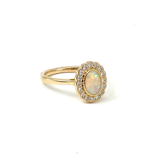 Large opal cluster ring, surrounded by sparkling natural diamonds.