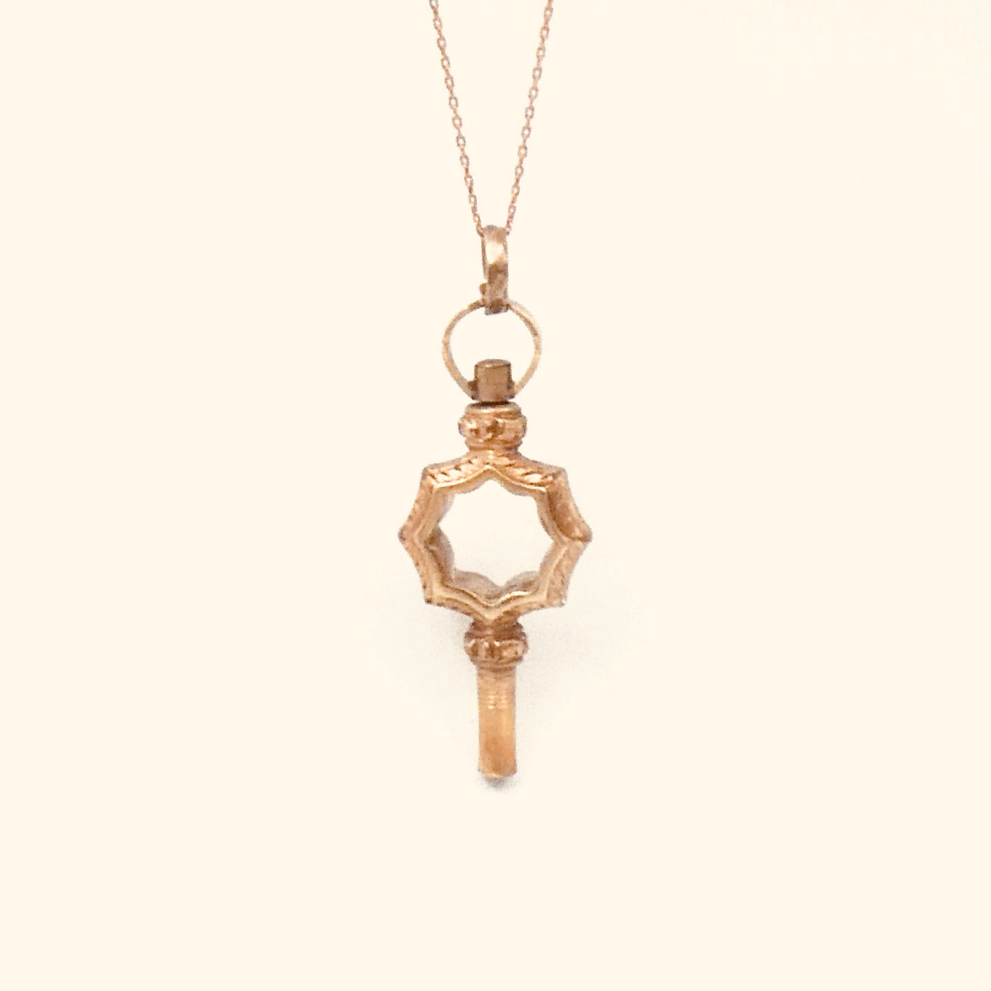 Antique watch key, a perfect antique pendant to hang on a chain, an old watch key.
