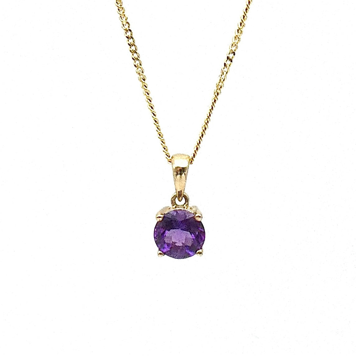 Amethyst 9kt gold pendant charm.