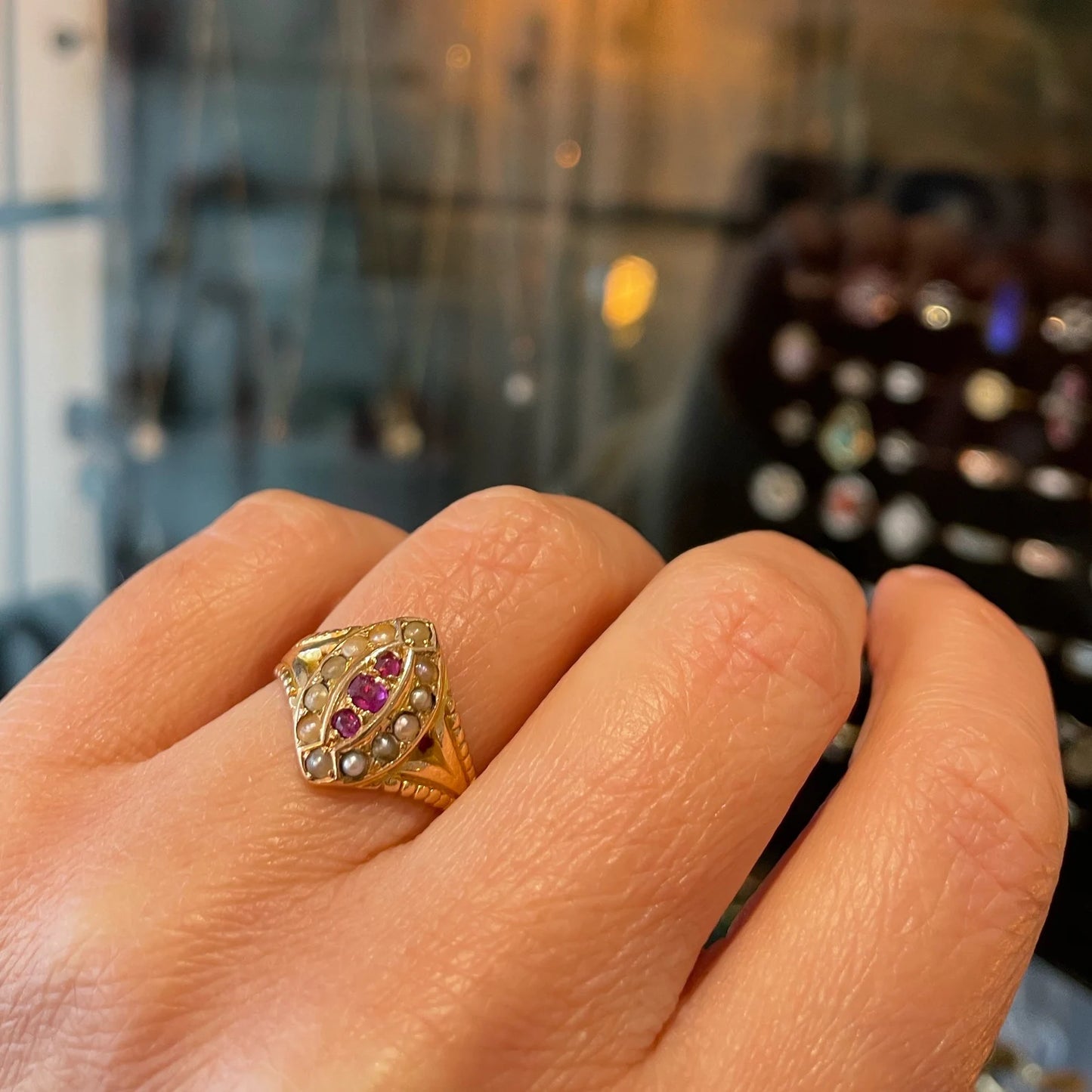 Antique ruby and pearl ring, a navette ring hallmarked 15kt gold