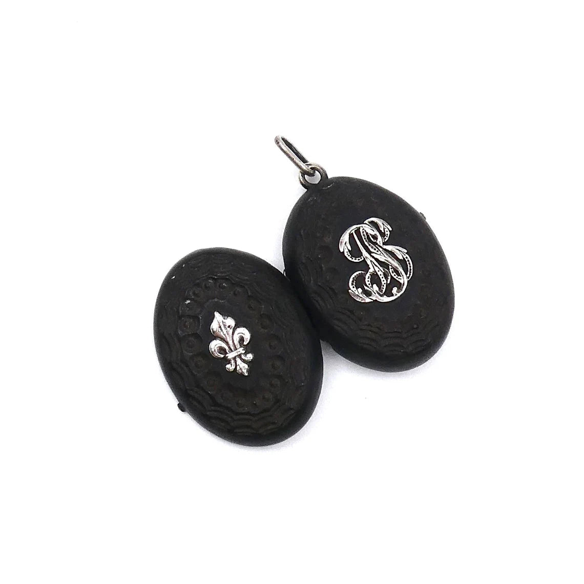 A unique carved black wooden locket with silver fleur de lis and initals in relief. - Collected