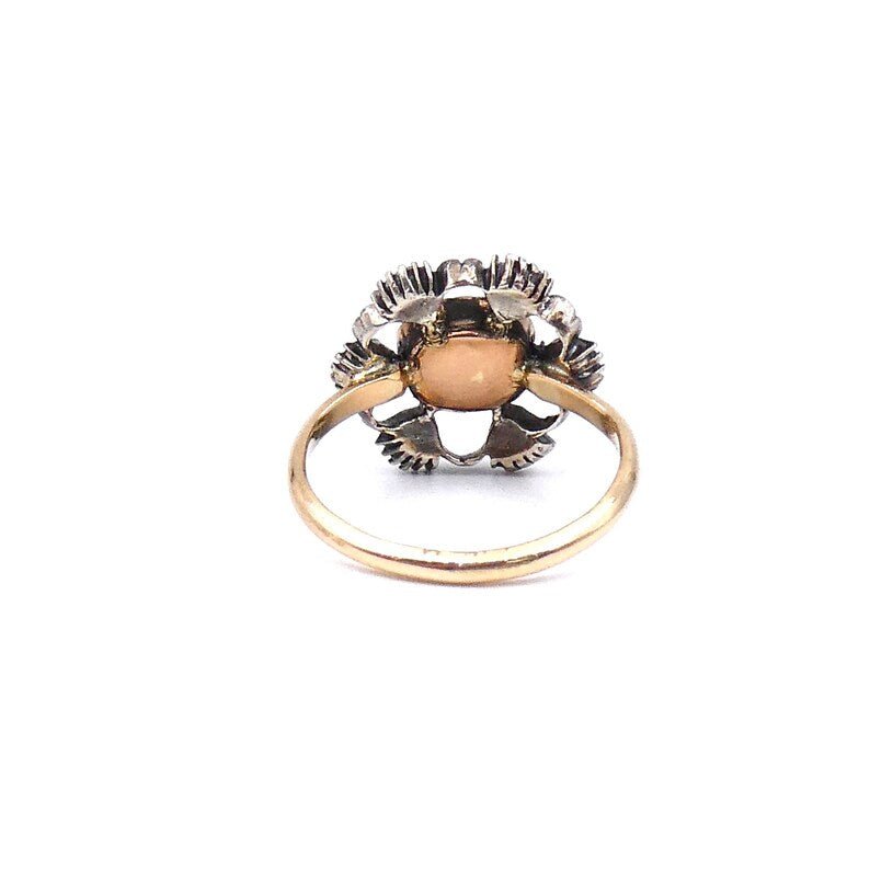 Antique garnet and old cut diamond ring with an open design. - Collected