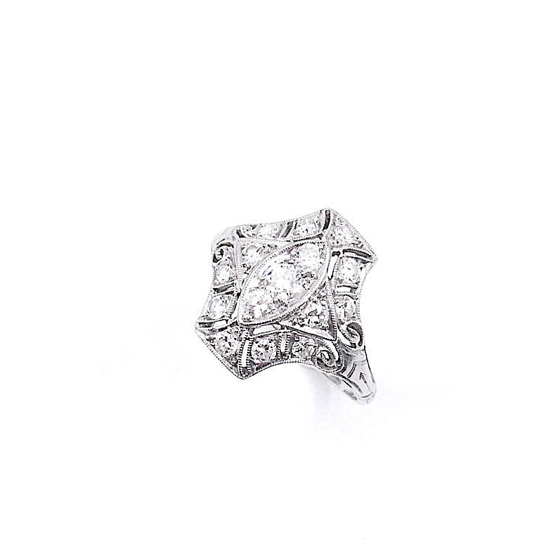 Art Deco diamond ring, with curved lines and a pierced setting. - Collected