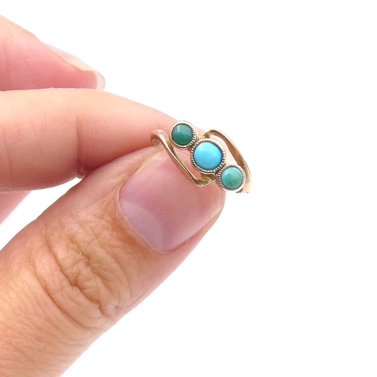 Three stone turquoise ring with a rose tone to the gold and a twist design, very small baby finger ring. - Collected