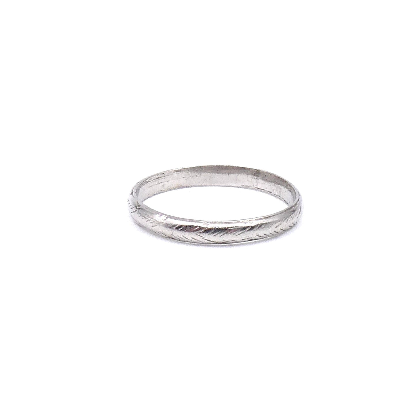 Vintage platinum band with a worn feathered pattern around the band. - Collected