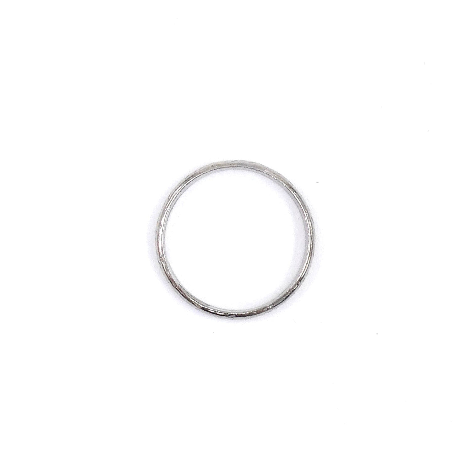 Vintage platinum band with a worn feathered pattern around the band. - Collected