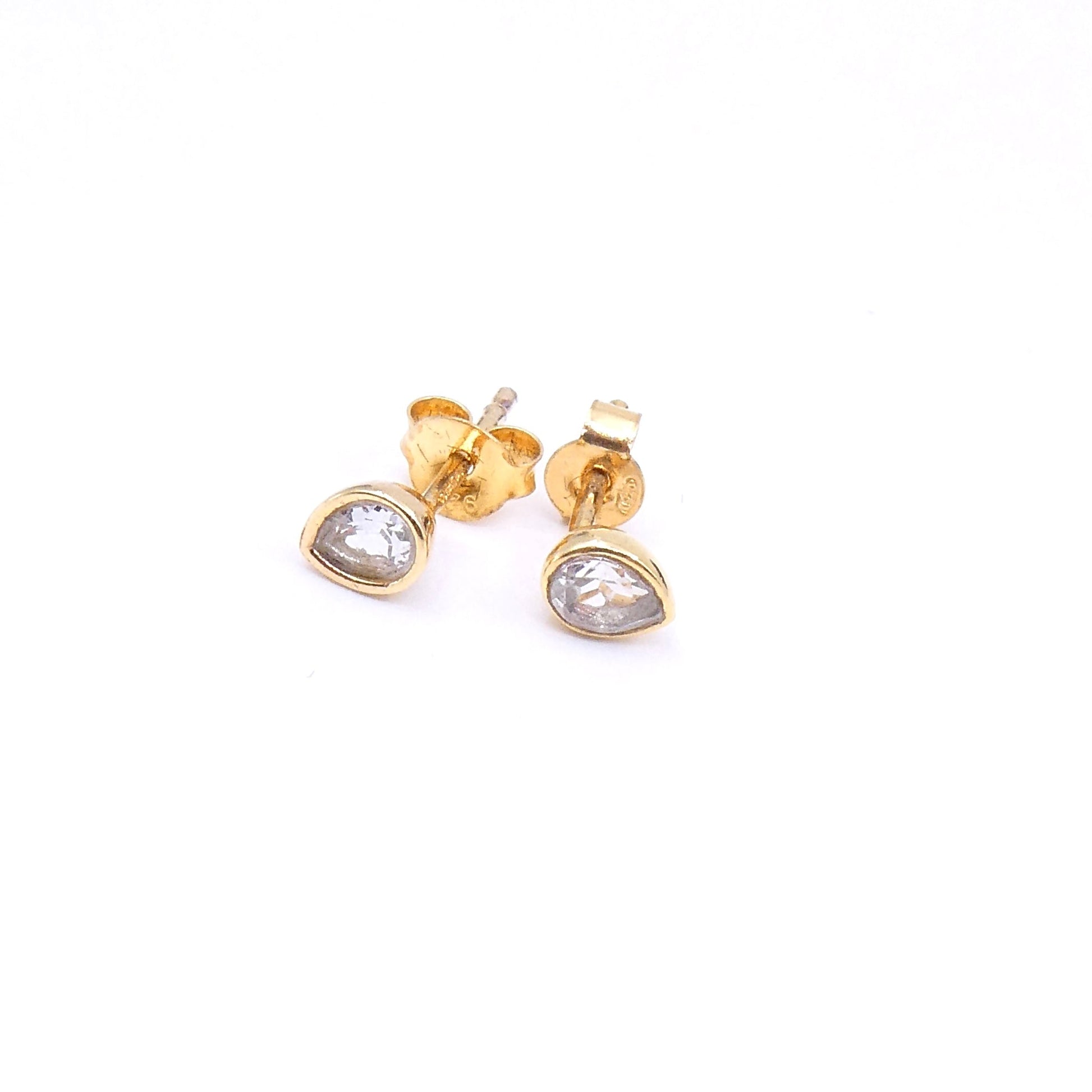 White topaz studs, pear shaped gold plated studs. - Collected