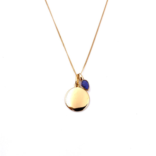 Gold Disc pendant with a lapis lazuli charm for an September Birthday.