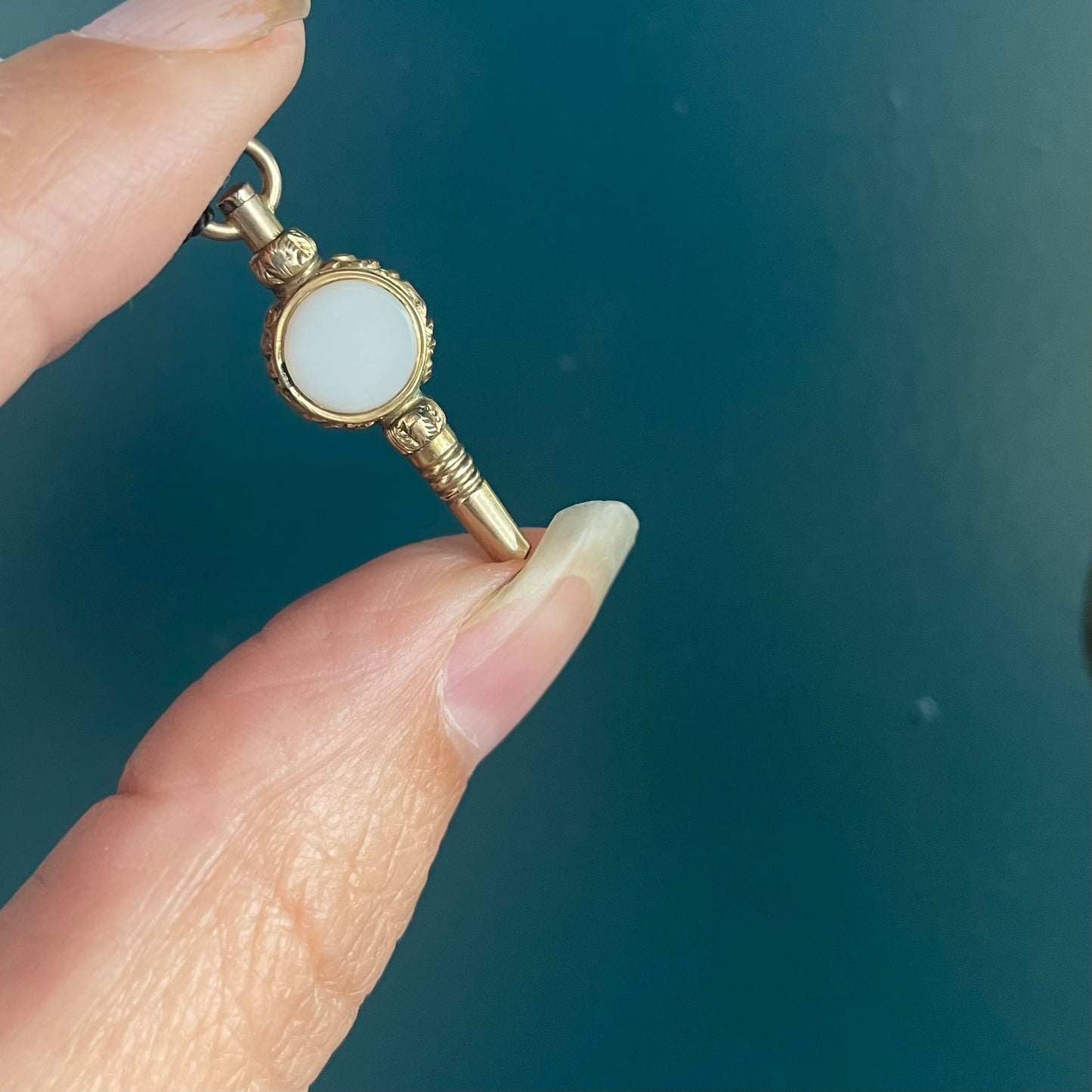 Antique Watch Key pendant, gold cased pendant for a chain.