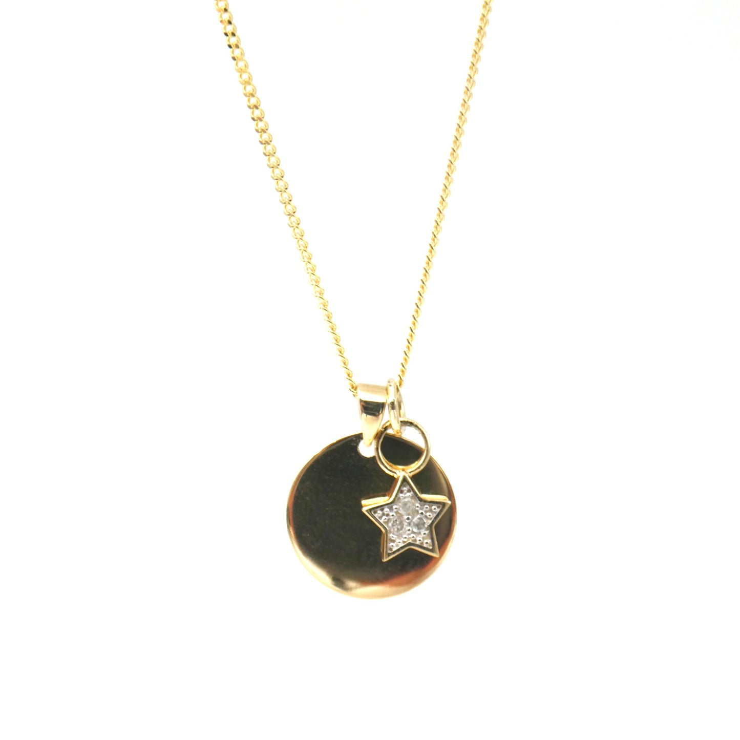 A Gold Disc Pendant with a 9kt gold and diamond star charm, diamond is the April Birthstone.