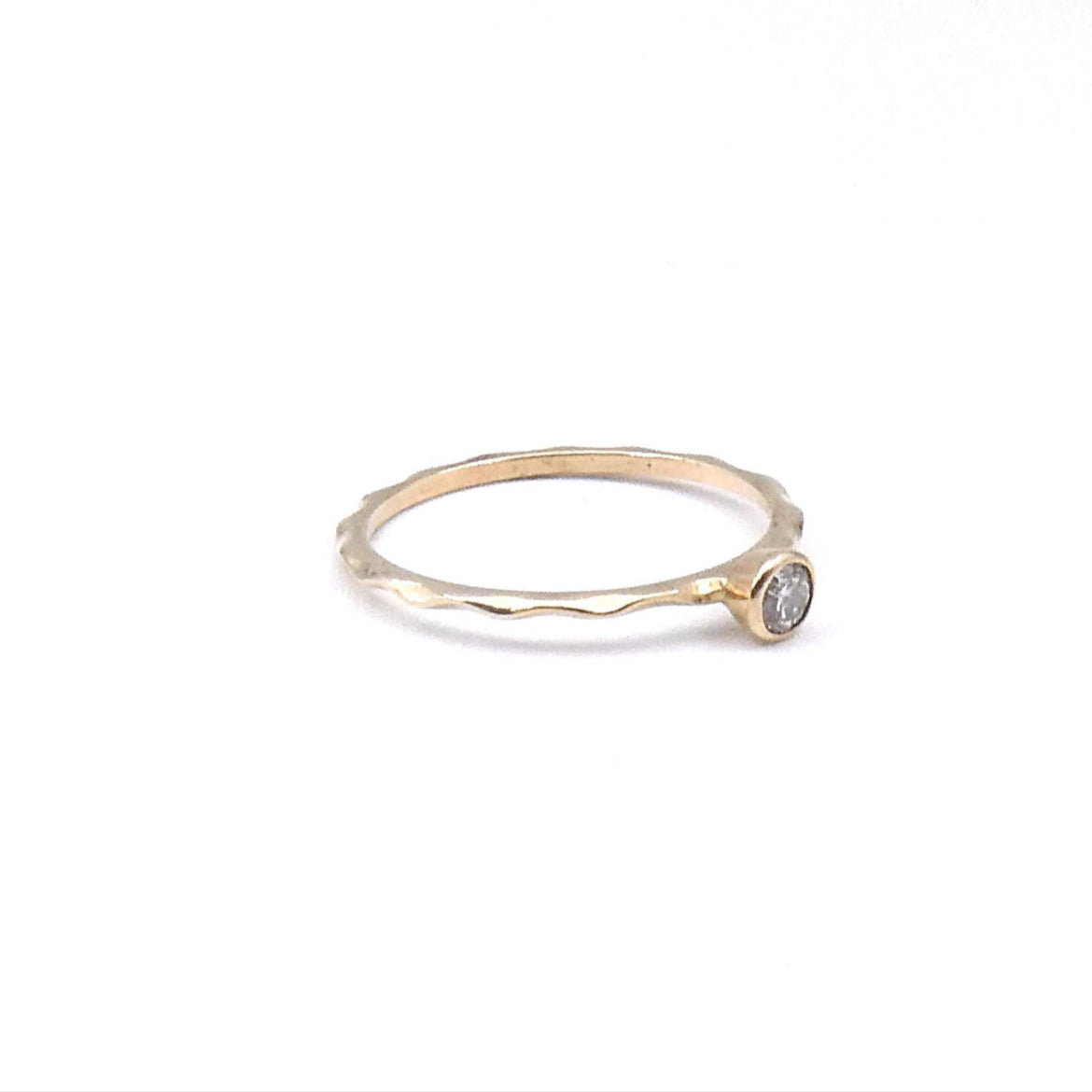 Diamond stacking ring on a 9kt wave band, preowned.