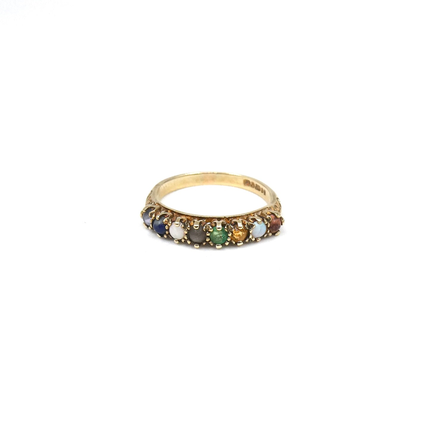 A Gemstone and 9kt gold band set with emerald, opals, lapis , citrine and agate.