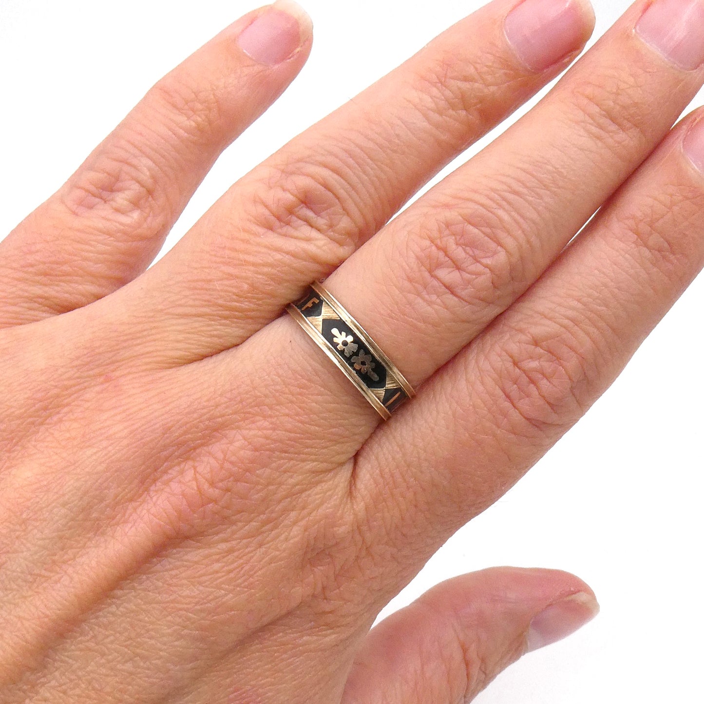 Antique Black enamel and gold ring from 1891.