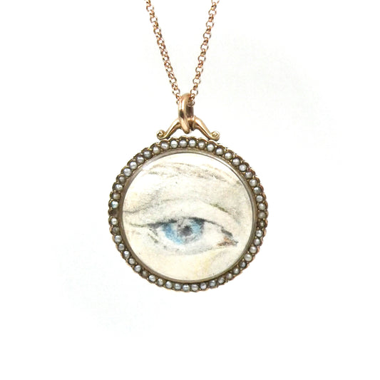 Antique rose gold locket with a border of pearls, hallmarked 9kt gold, Chester and 1907.