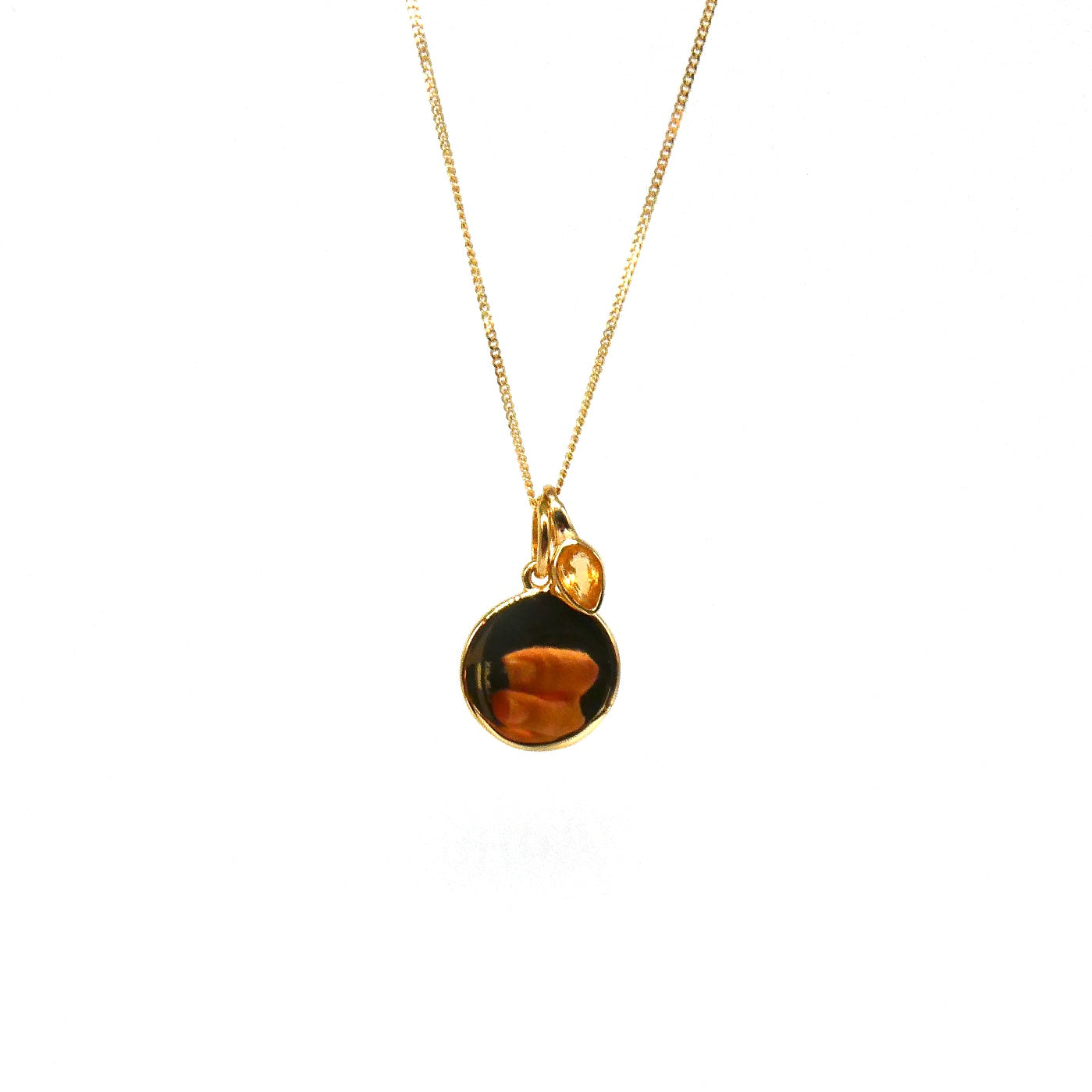 Gold disc pendant with a citrine charm for a November's Birthday.