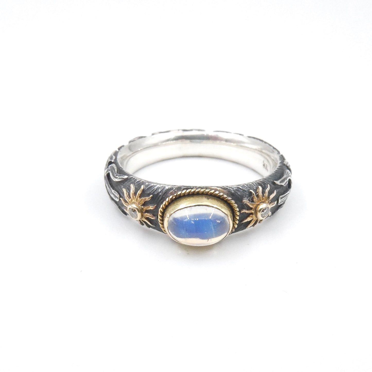 Moonstone and Diamond ring set in 18kt gold and Silver.