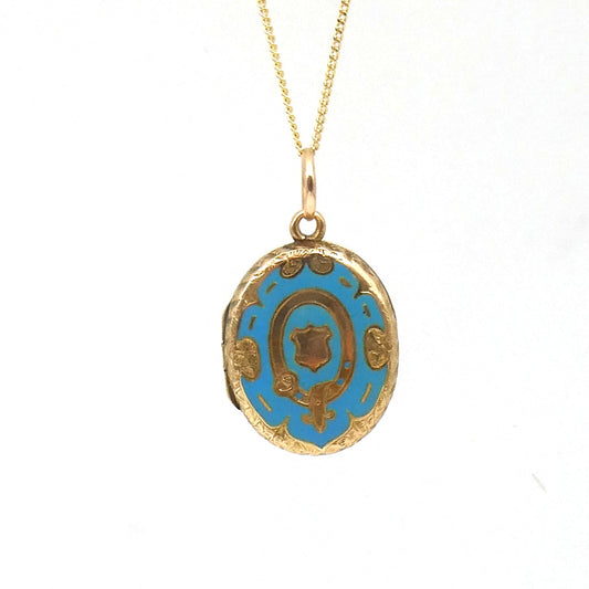 Antique Enamel Locket with blue enamel, within a victorian pattern of a belt like wreath around a shield