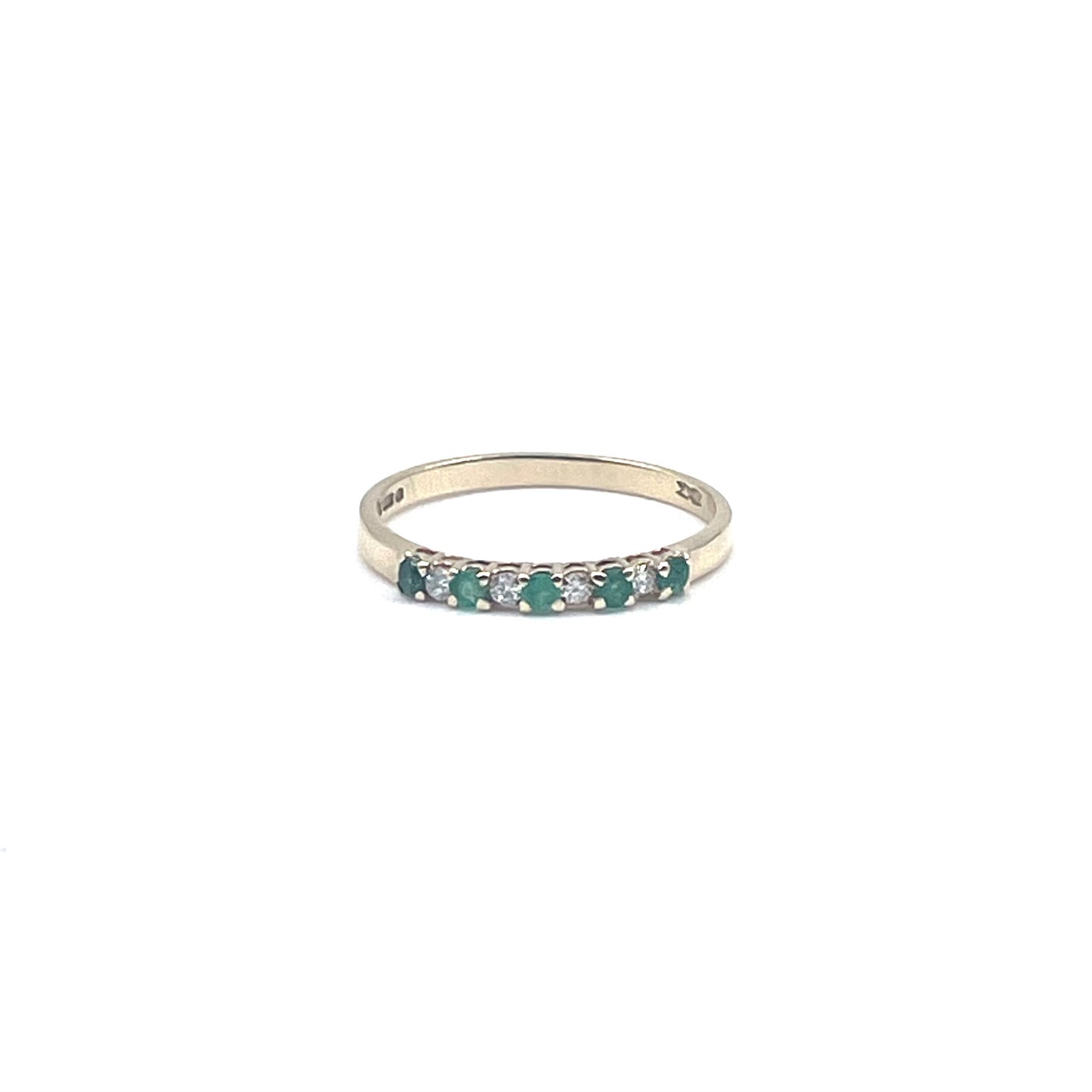 Fine alternating emerald and diamond stacking ring, preowned.