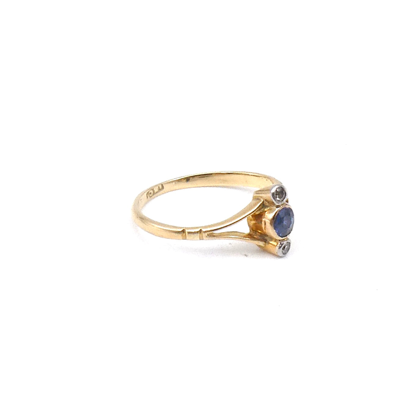 Vintage sapphire diamond ring, vertically set in an Edwardian open style.