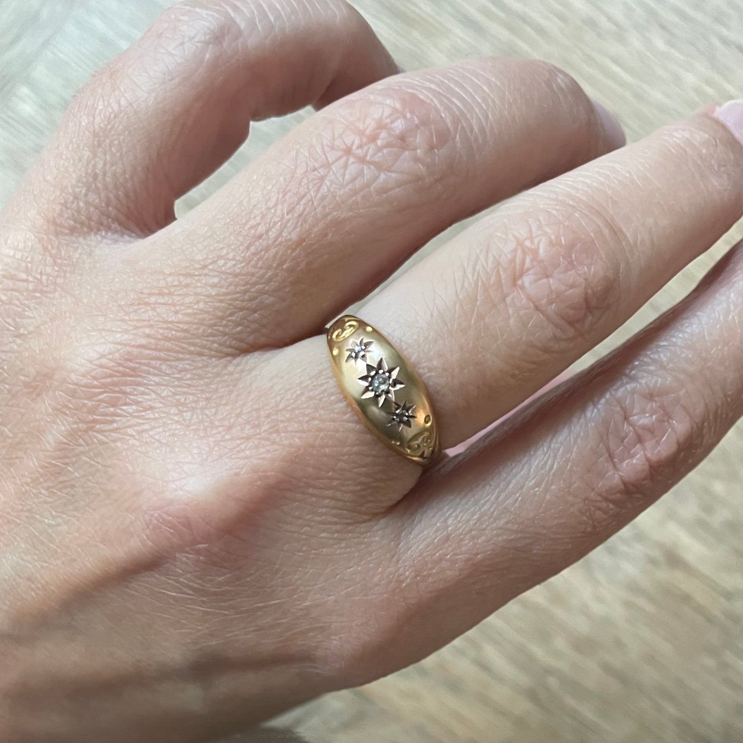 Antique gypsy ring set with tiny diamond accents.