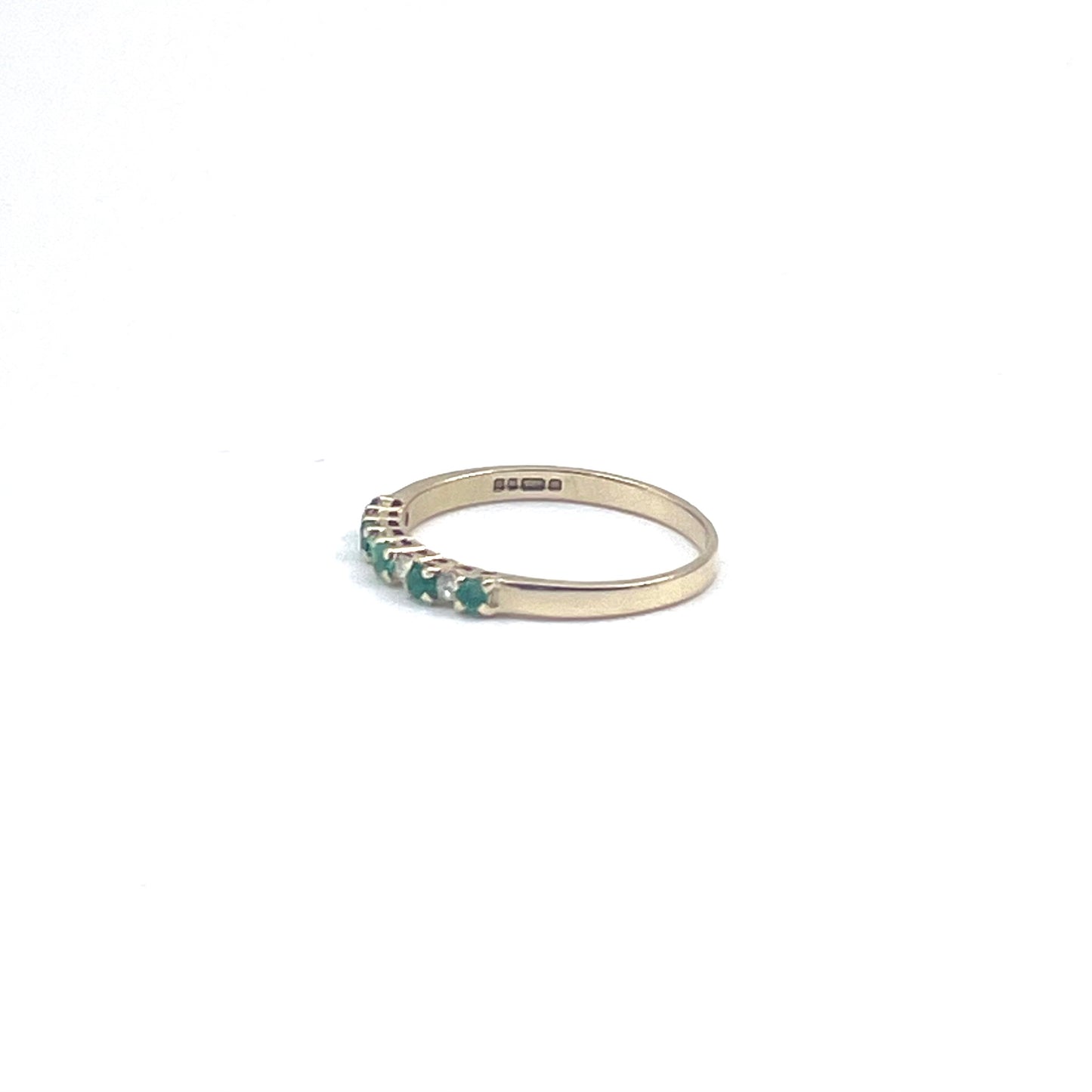 Fine alternating emerald and diamond stacking ring, preowned.