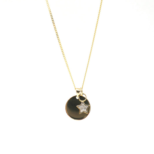 A Gold Disc Pendant with a 9kt gold and diamond star charm, diamond is the April Birthstone.