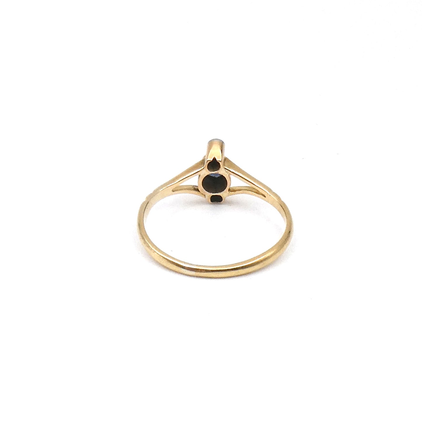 Vintage sapphire diamond ring, vertically set in an Edwardian open style.