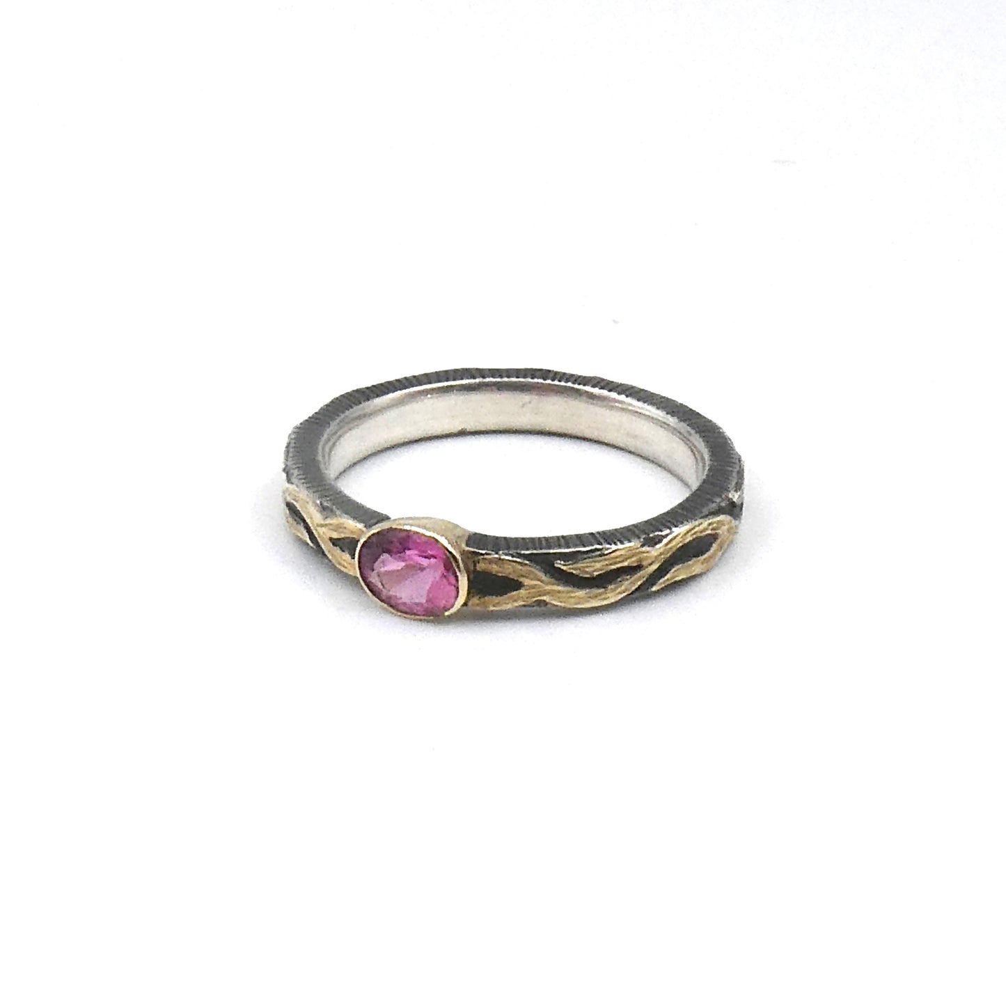 Tourmaline ring set in Silver with 18kt.