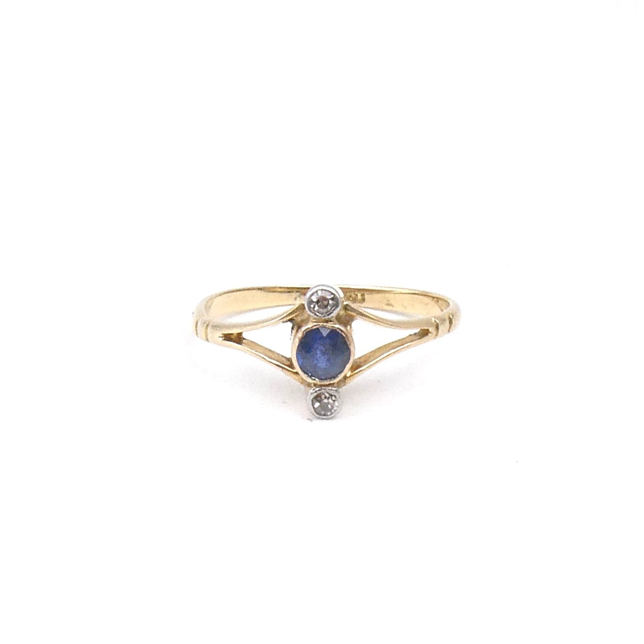 Vintage sapphire diamond ring, vertically set in an Edwardian open style.