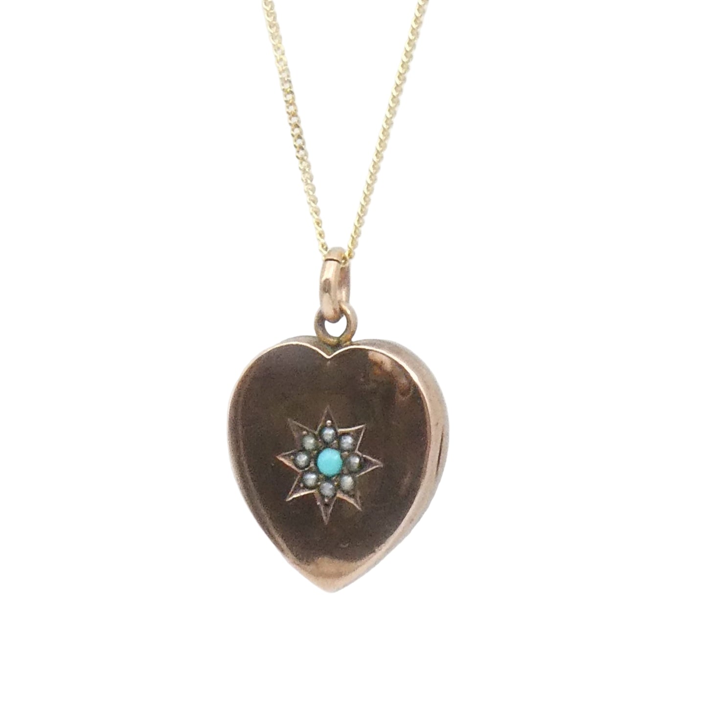 Antique Heart Locket and a turquoise and split pearl star set motif, on a 9kt gold chain.