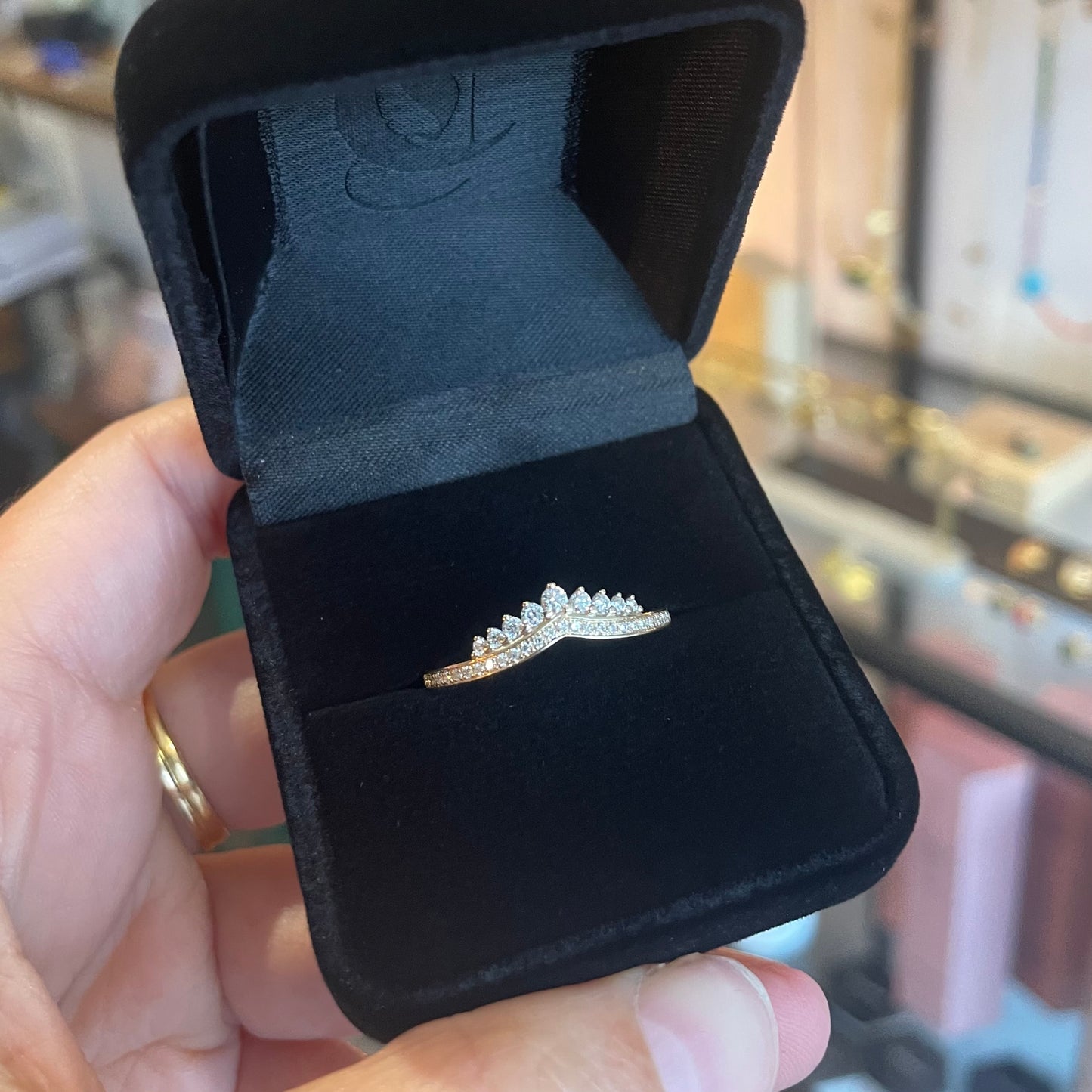 Diamond crown ring with graduating natural diamonds set in 9kt gold.