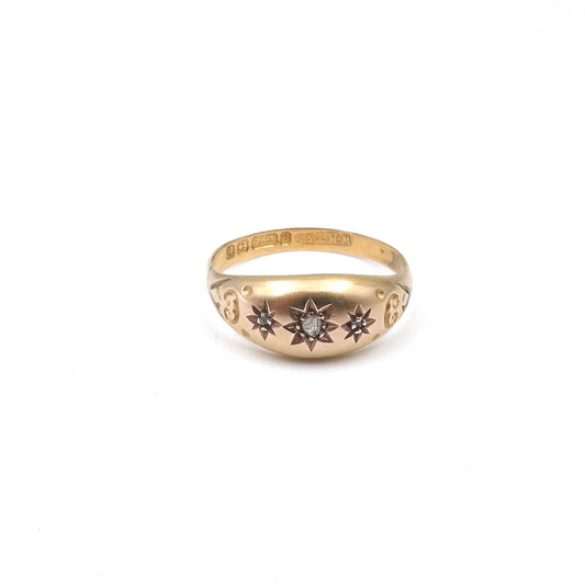 Antique gypsy ring set with tiny diamond accents.