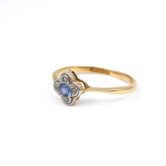Edwardian sapphire and diamond ring, a small antique ring a quatrefoil design.