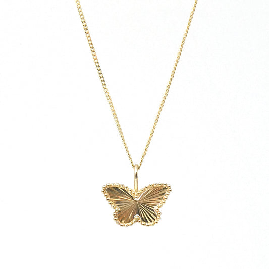 A 9kt gold faceted Butterfly pendant, a new contemporary piece.