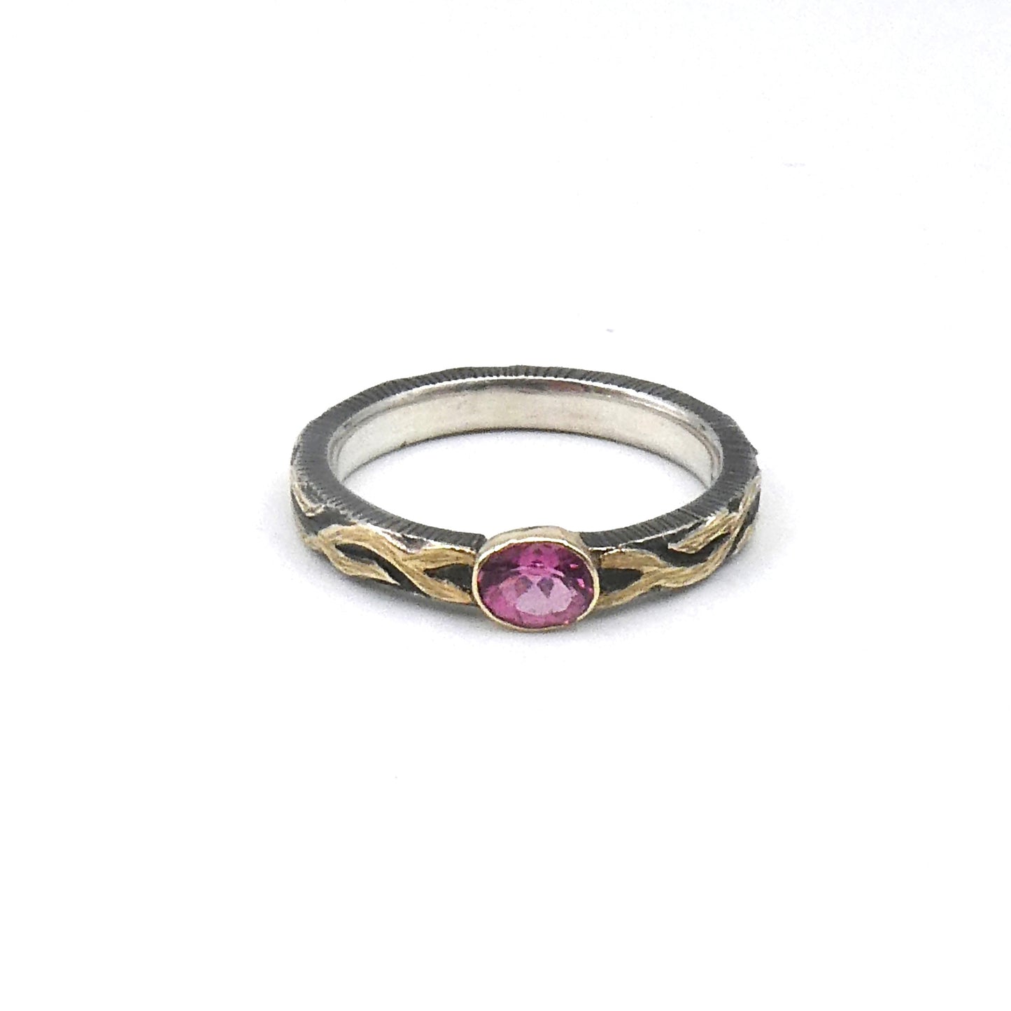 Tourmaline ring set in Silver with 18kt.