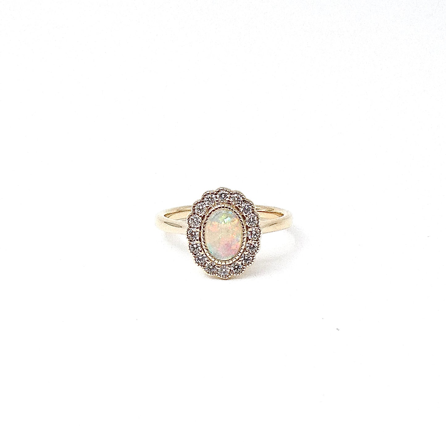 Large opal cluster ring, surrounded by sparkling natural diamonds.