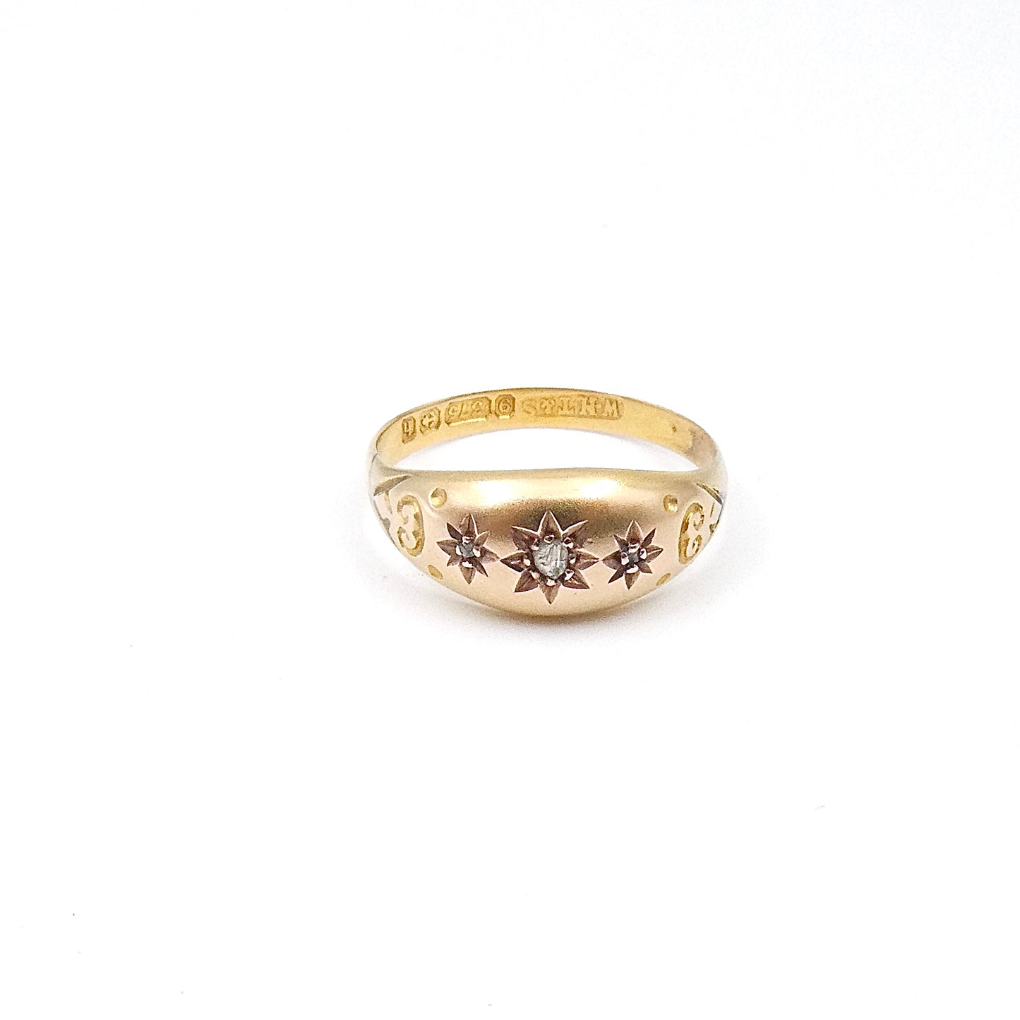 Antique gypsy ring set with tiny diamond accents.