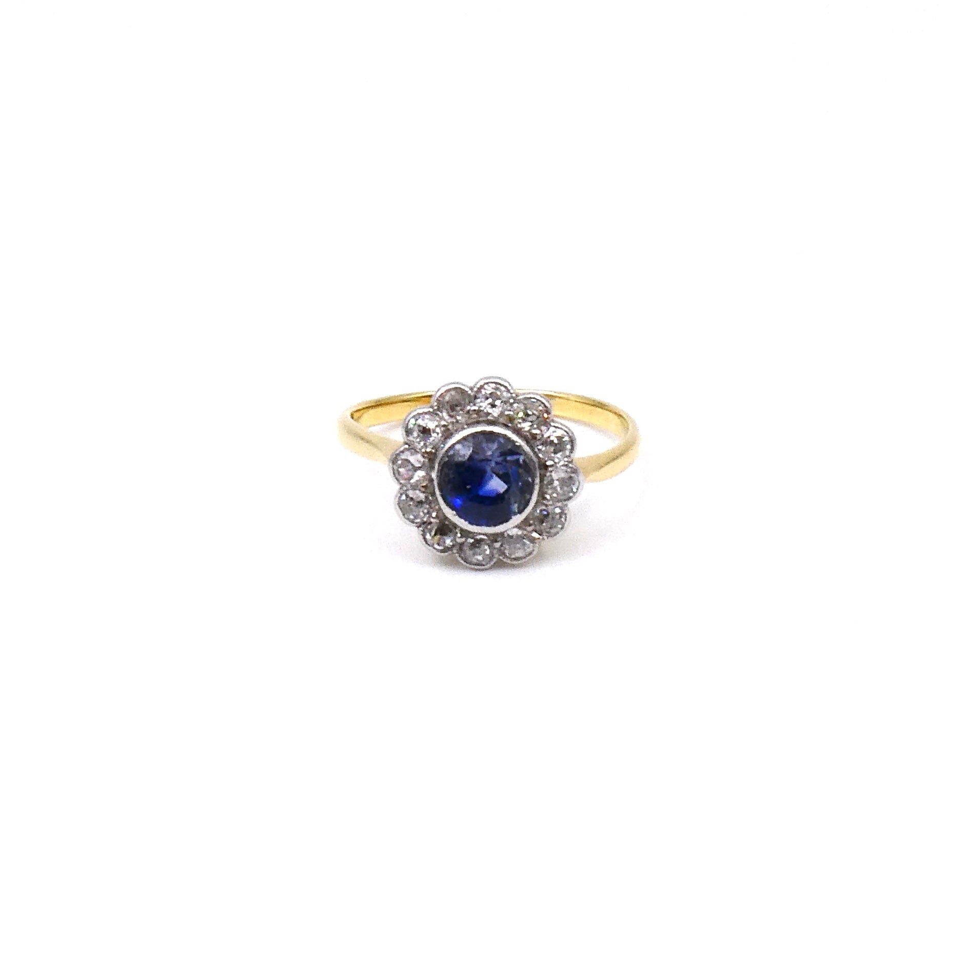 Antique sapphire daisy ring, 18kt cluster sapphire ring with old european cut diamonds and a sapphire. - Collected