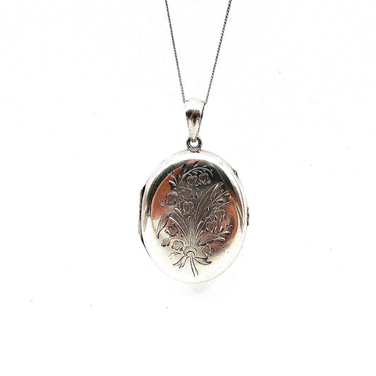 Engraved vintage locket, large oval silver locket with foliate engraving on a silver chain